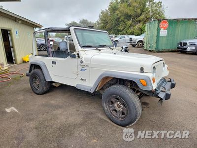 Czwarte zdjęcie samochodu z boku: 1997 JEEP WRANGLER / TJ SPORT VIN:1J4FY19S6VP405088 - miniatura