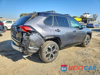 Trzecie zdjęcie samochodu z tyłu: 2022 TOYOTA RAV4 PRIME XSE VIN:JTMEB3FV3ND100811 - miniatura