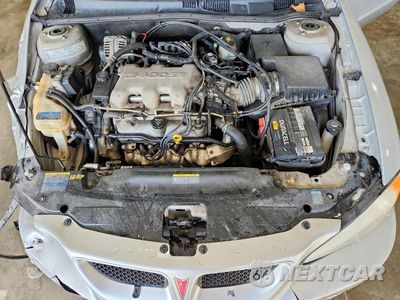 Zdjęcie 11 z 13 samochodu: 2005 PONTIAC GRAND AM SE VIN:1G2NE52E65M218932 - miniatura