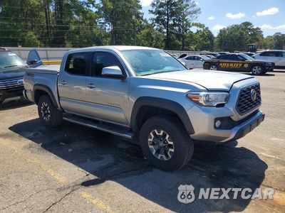 Czwarte zdjęcie samochodu z boku: 2022 TOYOTA TACOMA TRD OFF-ROAD VIN:3TMAZ5CN8NM183814 - miniatura