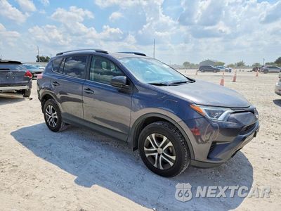 Czwarte zdjęcie samochodu z boku: 2018 TOYOTA RAV4 LE VIN:JTMBFREV0JJ746461 - miniatura