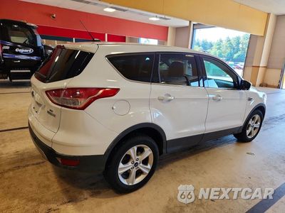 Trzecie zdjęcie samochodu z tyłu: 2015 FORD ESCAPE SE VIN:1FMCU0GX1FUA48298 - miniatura