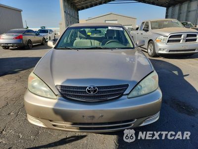 Piąte zdjęcie samochodu w środku: 2002 TOYOTA CAMRY LE VIN:4T1BE30K62U025862 - miniatura