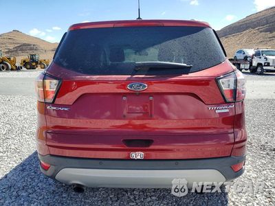 Zdjęcie 6 z 13 samochodu: 2017 FORD ESCAPE TITANIUM VIN:1FMCU0JD9HUC51120 - miniatura