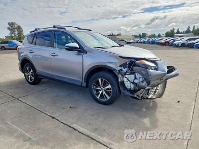 Czwarte zdjęcie samochodu z boku: 2018 TOYOTA RAV4 XLE VIN:2T3WFREV3JW443466 - miniatura