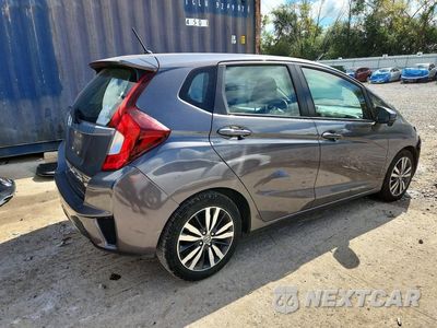 Trzecie zdjęcie samochodu z tyłu: 2015 HONDA FIT EX VIN:3HGGK5H82FM733724 - miniatura