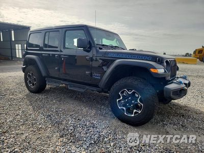 Czwarte zdjęcie samochodu z boku: 2022 JEEP WRANGLER UNLIMITED RUBICON 4XE VIN:1C4JJXR62NW113910 - miniatura