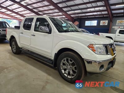 Czwarte zdjęcie samochodu z boku: 2016 NISSAN FRONTIER SL VIN:1N6AD0EV9GN762704 - miniatura