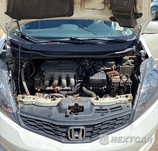 Zdjęcie 9 z 11 samochodu: 2013 HONDA FIT SPORT VIN:JHMGE8G51DC060792 - miniatura