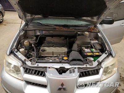 Zdjęcie 12 z 13 samochodu: 2005 MITSUBISHI OUTLANDER LS VIN:JA4LZ31F15U048933 - miniatura