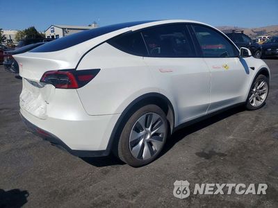Trzecie zdjęcie samochodu z tyłu: 2024 TESLA MODEL Y VIN:7SAYGDEE8RF059082 - miniatura