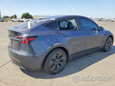 Trzecie zdjęcie samochodu z tyłu: 2023 TESLA MODEL Y VIN:7SAYGDEDXPF977677 - miniatura