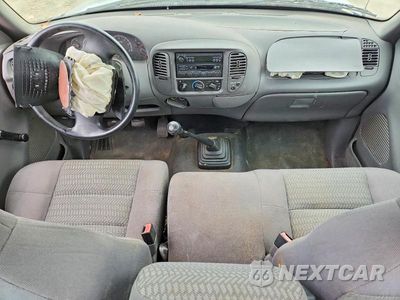 Zdjęcie 8 z 12 samochodu: 2003 FORD F150 VIN:1FTRF17273NB82922 - miniatura