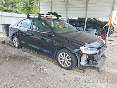 Czwarte zdjęcie samochodu z boku: 2014 VOLKSWAGEN JETTA SE VIN:3VWD07AJ9EM441001 - miniatura