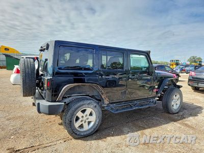 Trzecie zdjęcie samochodu z tyłu: 2011 JEEP WRANGLER UNLIMITED JEEP 70TH ANNIVERSARY VIN:1J4BA7H18BL589581 - miniatura