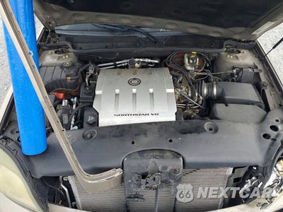 Zdjęcie 11 z 12 samochodu: 2004 CADILLAC DEVILLE VIN:1G6KD54Y14U216175 - miniatura