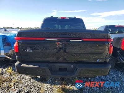 Zdjęcie 6 z 12 samochodu: 2024 FORD F150 LIGHTNING LARIAT VIN:1FT6W5L76RWG08517 - miniatura