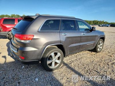 Trzecie zdjęcie samochodu z tyłu: 2014 JEEP GRAND CHEROKEE OVERLAND VIN:1C4RJFCG9EC272620 - miniatura