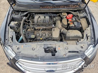 Zdjęcie 11 z 12 samochodu: 2017 FORD TAURUS SEL VIN:1FAHP2E80HG118261 - miniatura