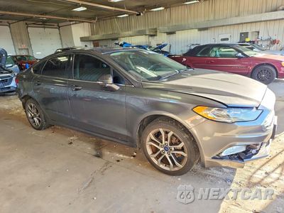 Czwarte zdjęcie samochodu z boku: 2017 FORD FUSION SE VIN:3FA6P0T99HR236566 - miniatura