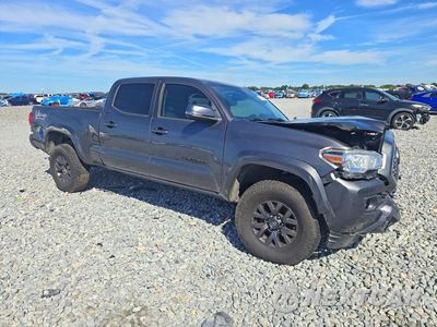 Czwarte zdjęcie samochodu z boku: 2023 TOYOTA TACOMA SR5 V6 VIN:3TYDZ5BN8PT019694 - miniatura