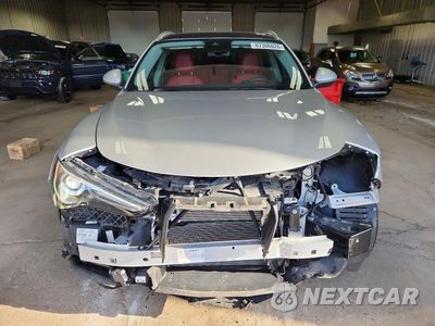 Piąte zdjęcie samochodu w środku: 2021 ALFA ROMEO STELVIO TI VIN:ZASPAKBN7M7D13387 - miniatura