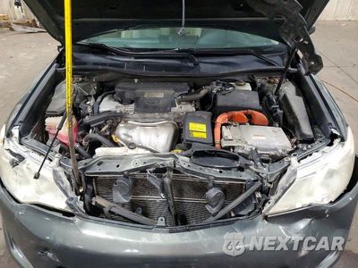 Zdjęcie 11 z 12 samochodu: 2012 TOYOTA CAMRY HYBRID XLE VIN:4T1BD1FK2CU034266 - miniatura