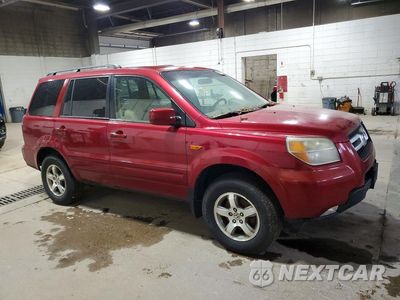 Czwarte zdjęcie samochodu z boku: 2006 HONDA PILOT EX VIN:2HKYF18426H523174 - miniatura