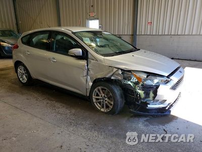 Czwarte zdjęcie samochodu z boku: 2017 FORD FOCUS SE VIN:1FADP3K27HL225187 - miniatura