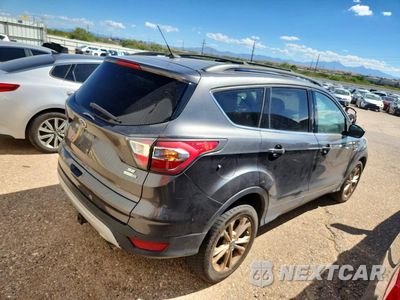Trzecie zdjęcie samochodu z tyłu: 2017 FORD ESCAPE SE VIN:1FMCU9G92HUA73767 - miniatura