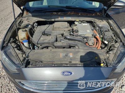 Zdjęcie 11 z 12 samochodu: 2017 FORD FUSION SE HYBRID VIN:3FA6P0LU7HR297161 - miniatura