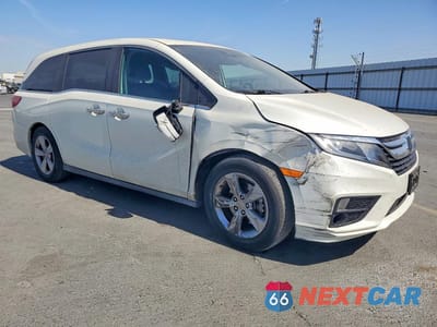 Czwarte zdjęcie samochodu z boku: 2018 HONDA ODYSSEY EXL VIN:5FNRL6H77JB049069 - miniatura