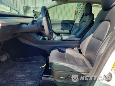 Zdjęcie 7 z 13 samochodu: 2022 TESLA MODEL Y VIN:7SAYGDEE4NF439742 - miniatura