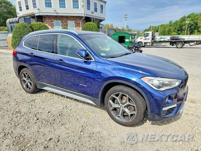 Czwarte zdjęcie samochodu z boku: 2016 BMW X1 XDRIVE28I VIN:WBXHT3C3XGP887161 - miniatura