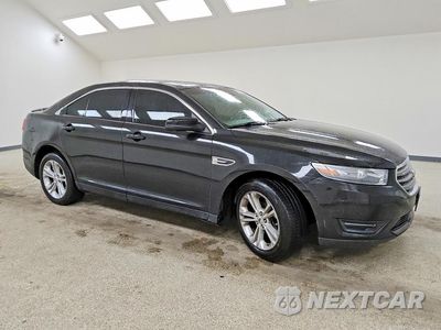 Czwarte zdjęcie samochodu z boku: 2014 FORD TAURUS SEL VIN:1FAHP2H85EG133653 - miniatura