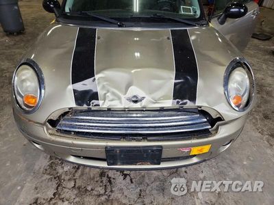 Zdjęcie 11 z 12 samochodu: 2010 MINI COOPER VIN:WMWMF3C53ATU79195 - miniatura