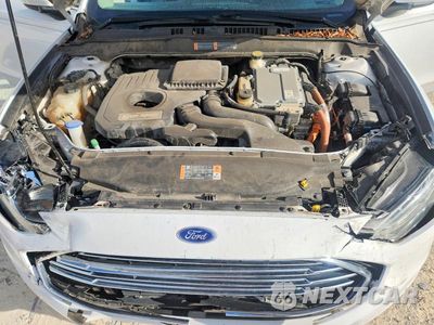 Zdjęcie 11 z 12 samochodu: 2017 FORD FUSION SE HYBRID VIN:3FA6P0LU2HR393179 - miniatura