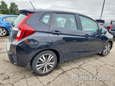 Trzecie zdjęcie samochodu z tyłu: 2017 HONDA FIT EX VIN:3HGGK5H76HM714278 - miniatura