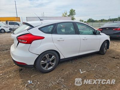 Trzecie zdjęcie samochodu z tyłu: 2016 FORD FOCUS SE VIN:1FADP3KE8GL403732 - miniatura