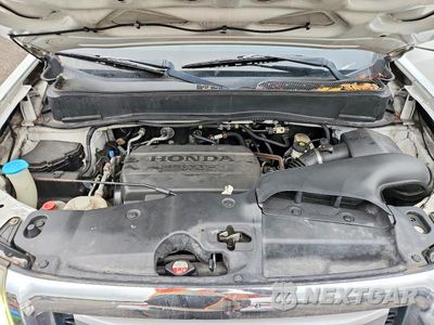 Zdjęcie 12 z 13 samochodu: 2011 HONDA PILOT EXL VIN:5FNYF3H55BB006688 - miniatura
