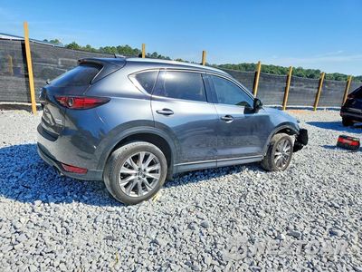 Trzecie zdjęcie samochodu z tyłu: 2021 MAZDA CX-5 GRAND TOURING RESERVE VIN:JM3KFBAY9M0439413 - miniatura