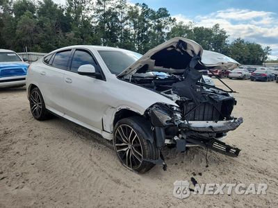 Czwarte zdjęcie samochodu z boku: 2026 BMW X6 XDRIVE40I VIN:5UX33EX02T9271602 - miniatura