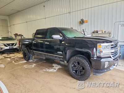 Czwarte zdjęcie samochodu z boku: 2016 CHEVROLET SILVERADO K1500 HIGH COUNTRY VIN:3GCUKTEC9GG104301 - miniatura