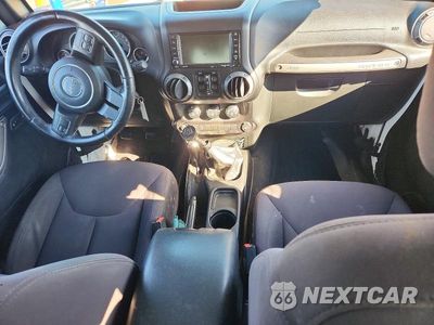 Zdjęcie 8 z 12 samochodu: 2015 JEEP WRANGLER UNLIMITED SPORT VIN:1C4BJWDG1FL590412 - miniatura