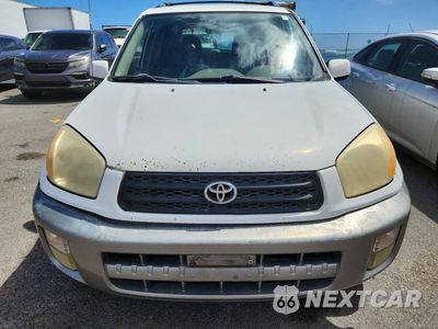 Piąte zdjęcie samochodu w środku: 2001 TOYOTA RAV4 BASE VIN:JTEGH20V910019819 - miniatura