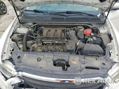 Zdjęcie 11 z 12 samochodu: 2014 FORD TAURUS SEL VIN:1FAHP2E82EG132772 - miniatura