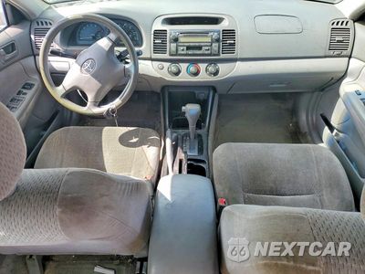 Zdjęcie 8 z 13 samochodu: 2003 TOYOTA CAMRY LE VIN:JTDBE32K130170897 - miniatura