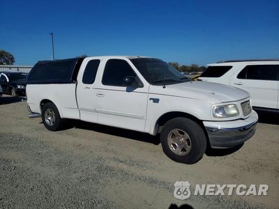 Czwarte zdjęcie samochodu z boku: 1999 FORD F150 VIN:1FTRX17W4XKA37649 - miniatura