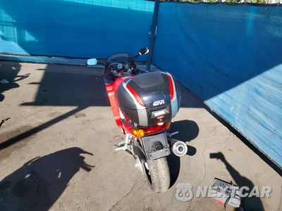 Czwarte zdjęcie samochodu z boku: 1998 HONDA VFR800 F1 VIN:JH2RC4618WM000133 - miniatura