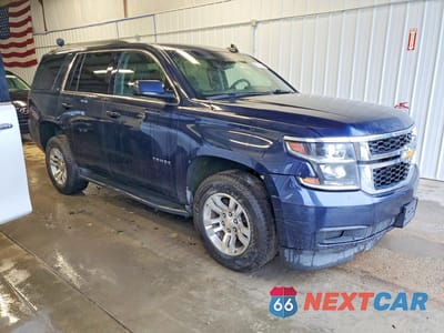 Czwarte zdjęcie samochodu z boku: 2019 CHEVROLET TAHOE K1500 LT VIN:1GNSKBKC2KR364612 - miniatura